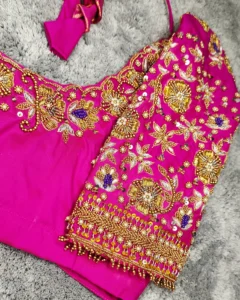 South Indian bridal blouse with embroidery work and rich silk fabric design