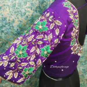 Custom bridal blouse stitching with elegant neckline and bridal embroidery work
