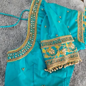 Modern bridal blouse pattern with detailed handwork and fashionable back design